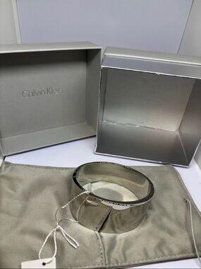 Calvin Klein Shiny Silver Cuff Bracelet with Branded Pouch